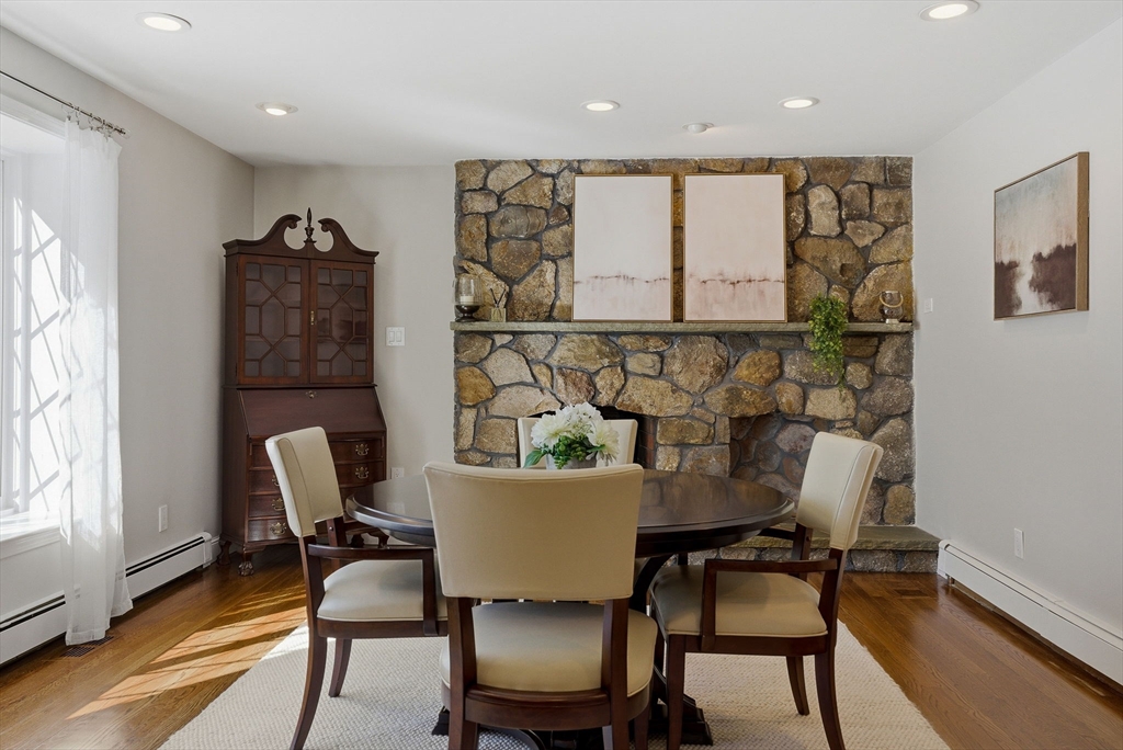 10 Bridle Path North Andover, MA 01845 - Photo 6 of 42 a view of a dining room with furniture and wooden floor