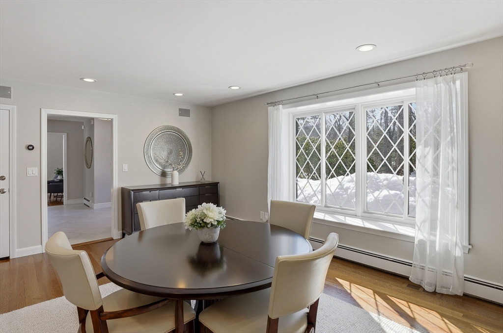 10 Bridle Path North Andover, MA 01845 - Photo 9 of 42 a dining room with furniture and wooden floor