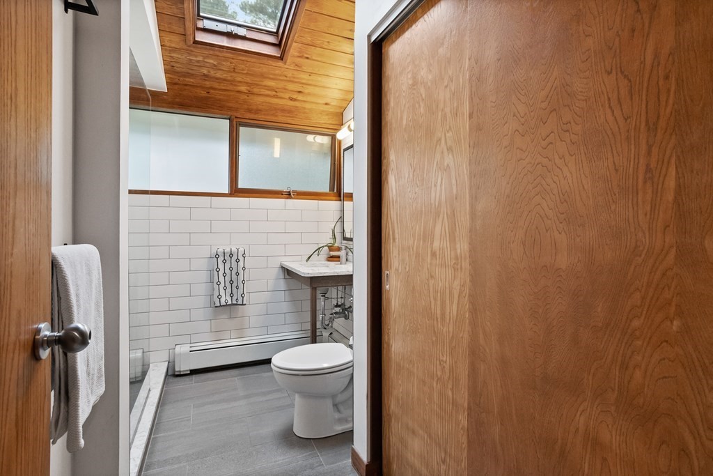 88 Heald Road Carlisle, MA 01741 - Photo 15 of 42 a bathroom with a toilet and a shower