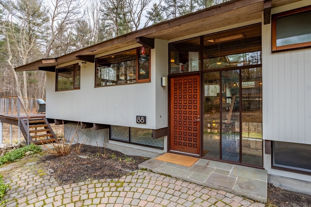 88 Heald Road Carlisle, MA 01741 - Photo 41 of 42 a front view of a house with a yard