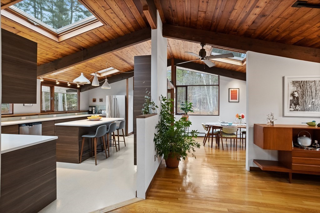 88 Heald Road Carlisle, MA 01741 - Photo 7 of 42 a dining room with wooden floor and breakfast area