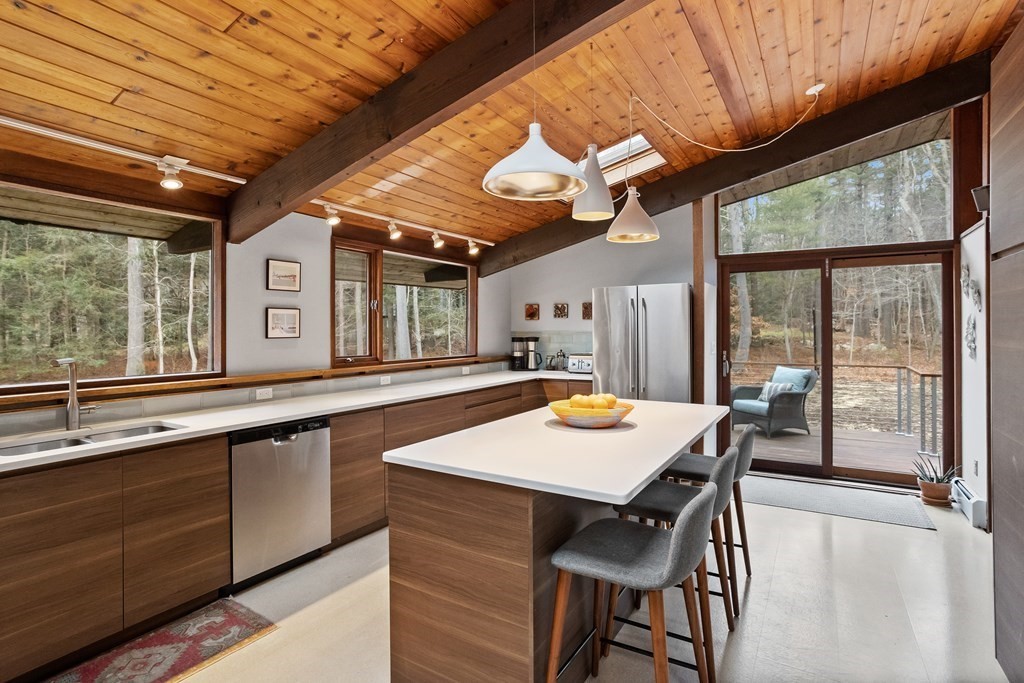 88 Heald Road Carlisle, MA 01741 - Photo 8 of 42 a view of a dining room with furniture window and outside view