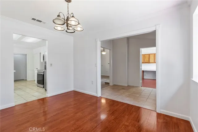 a view of an entryway and livingroom