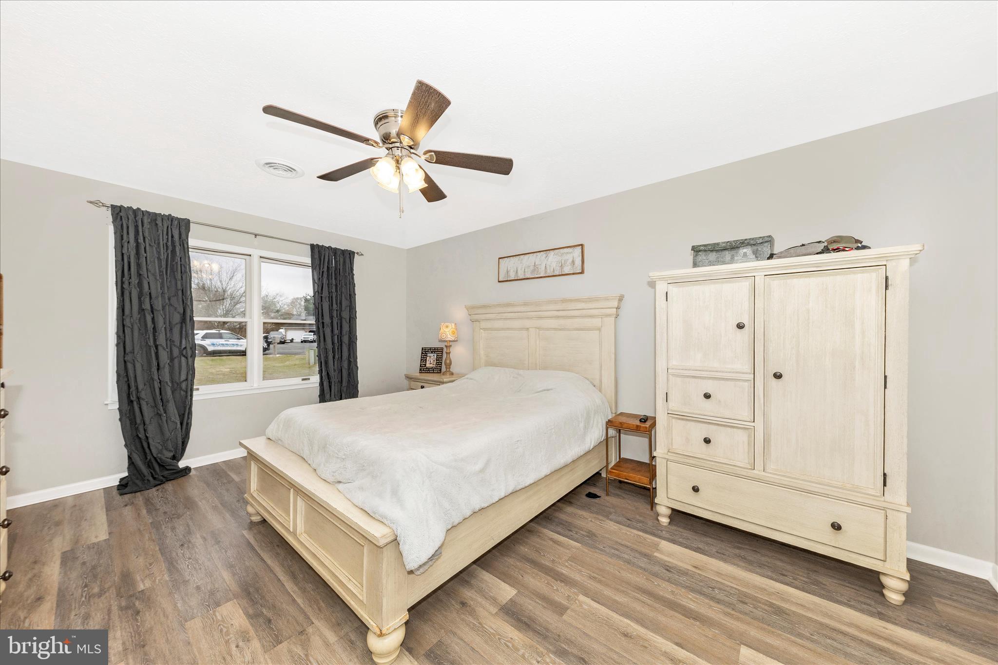 126 Game Trail Road Falling Waters, WV 25419 - Photo 17 of 41 a bedroom with a bed and a window