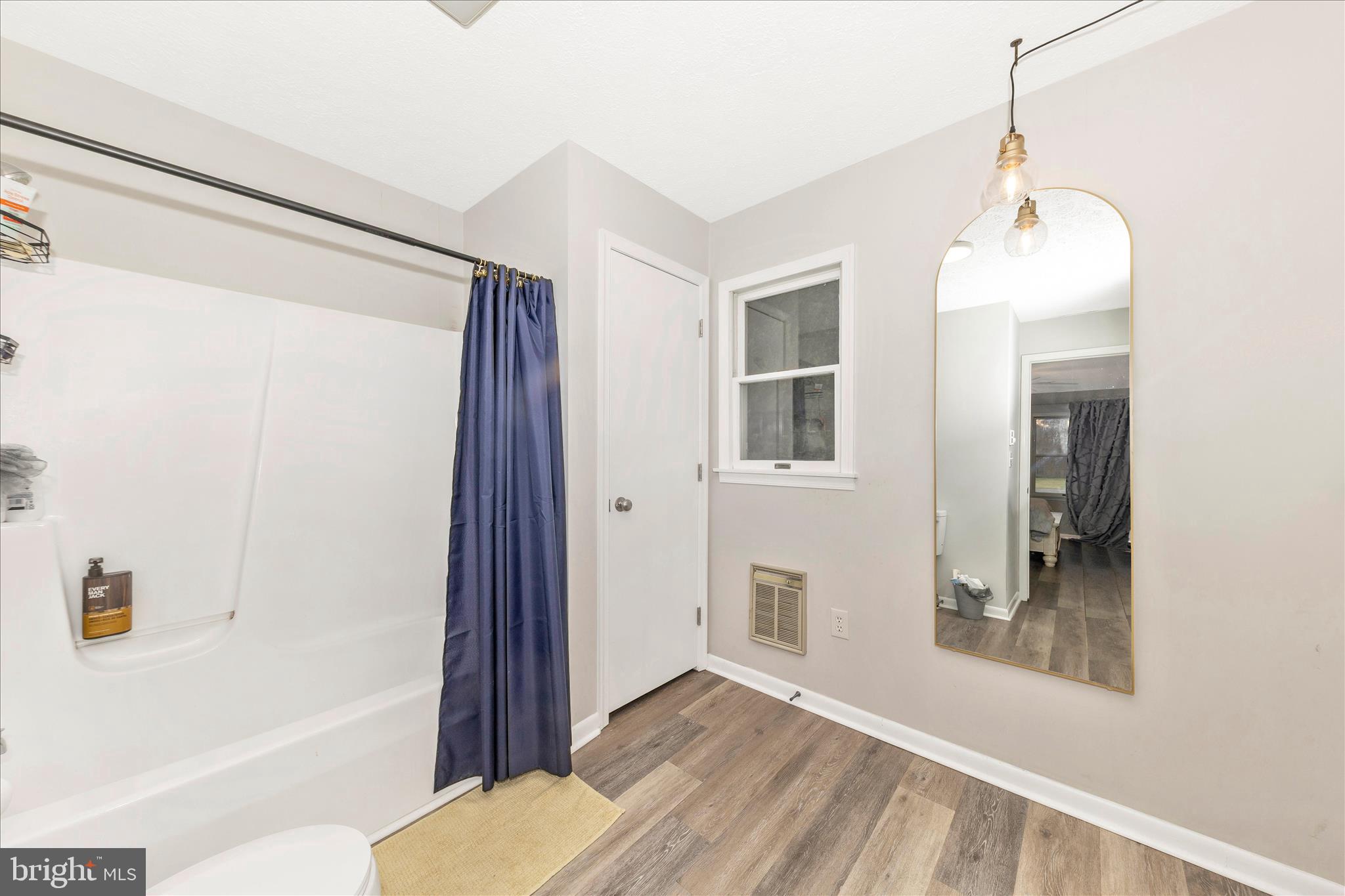 126 Game Trail Road Falling Waters, WV 25419 - Photo 21 of 41 a bathroom with a bathtub and a shower