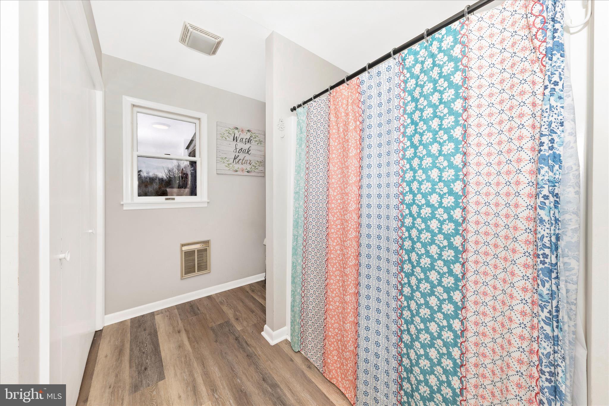 126 Game Trail Road Falling Waters, WV 25419 - Photo 22 of 41 a view of hallway with closet and wooden floor