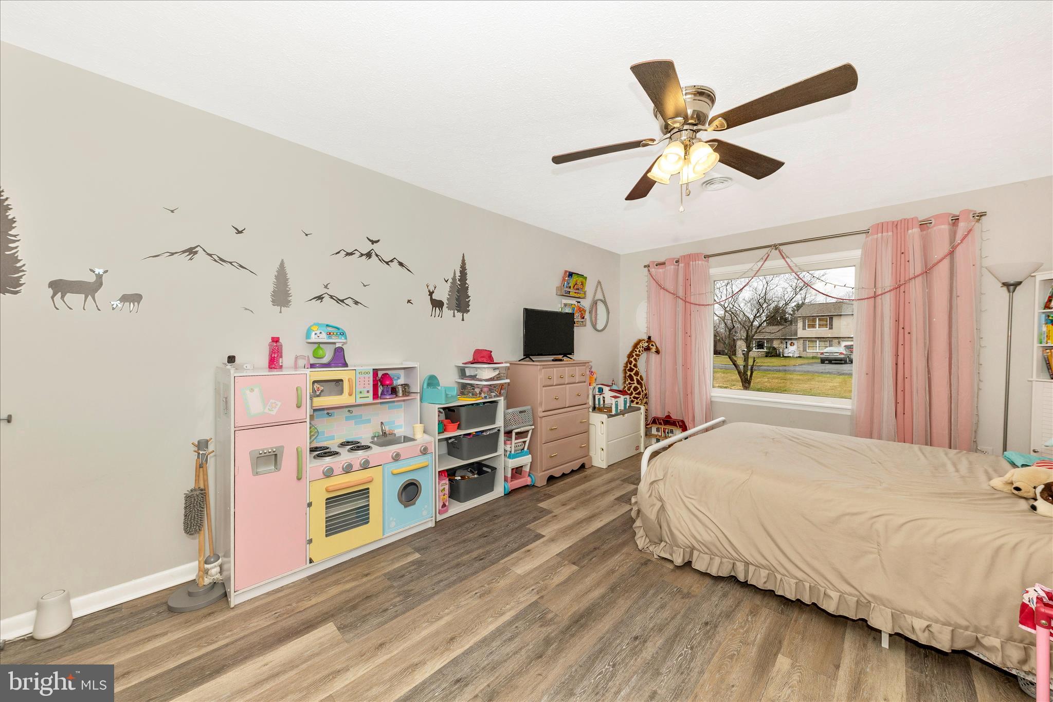 126 Game Trail Road Falling Waters, WV 25419 - Photo 24 of 41 a bedroom with a bed and a window