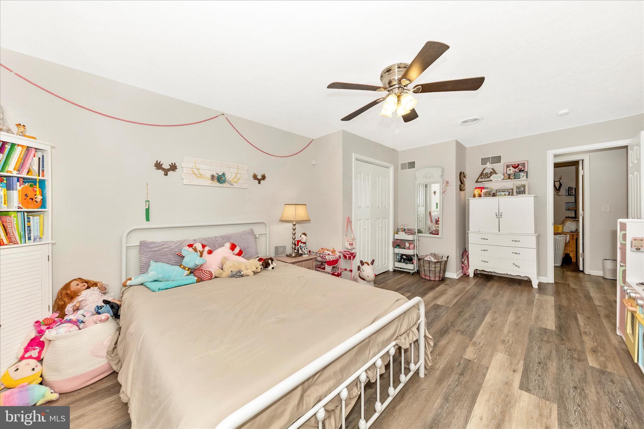 126 Game Trail Road Falling Waters, WV 25419 - Photo 26 of 41 a bedroom with furniture and white walls