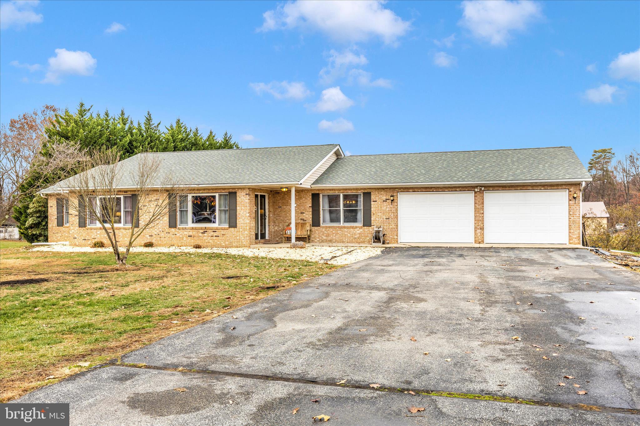 126 Game Trail Road Falling Waters, WV 25419 - Photo 3 of 41 a view of a house with a swimming pool and sitting area