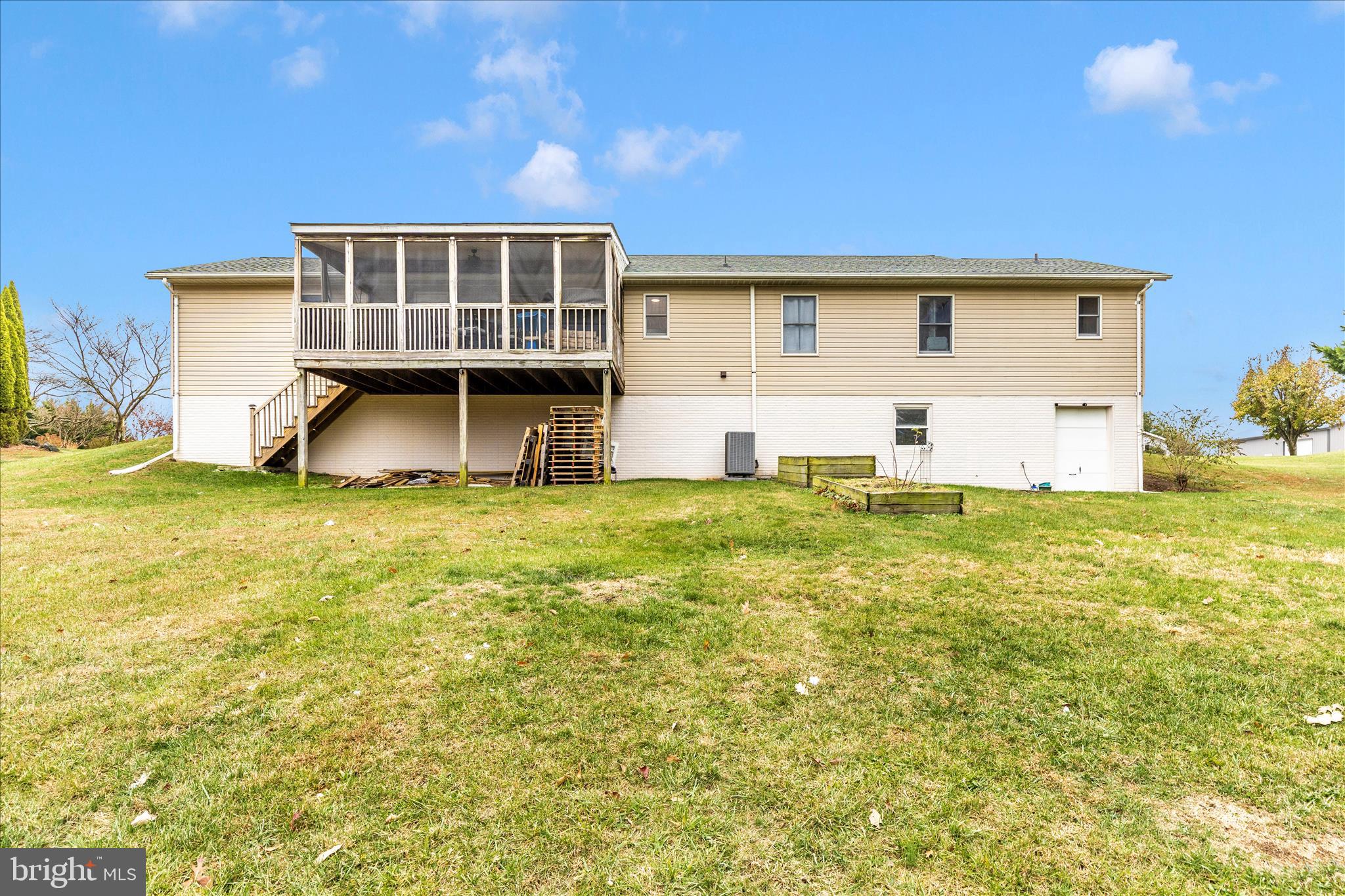 126 Game Trail Road Falling Waters, WV 25419 - Photo 31 of 41 a view of a house with a yard