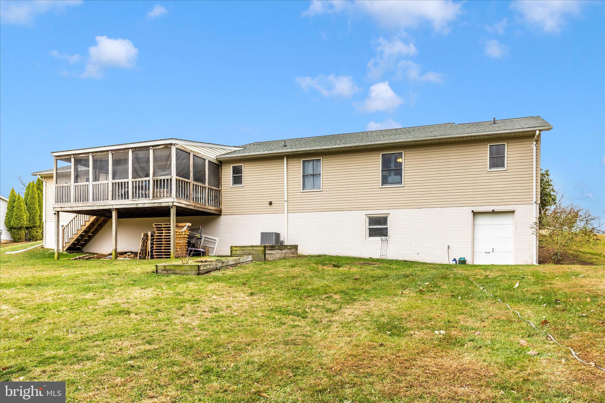 126 Game Trail Road Falling Waters, WV 25419 - Photo 32 of 41 a big house with swimming pool in front of it