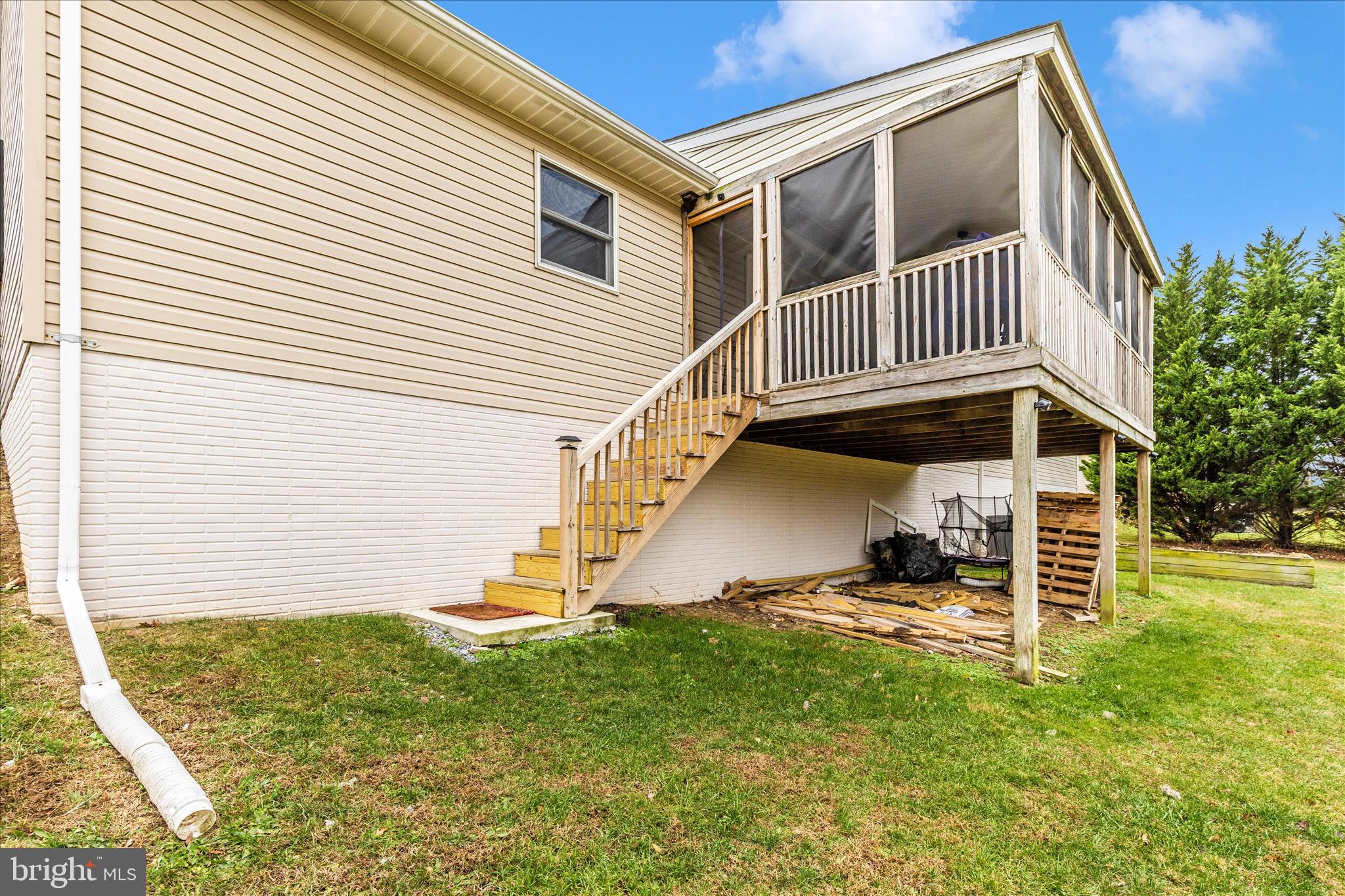 126 Game Trail Road Falling Waters, WV 25419 - Photo 33 of 41 a view of a house with a yard