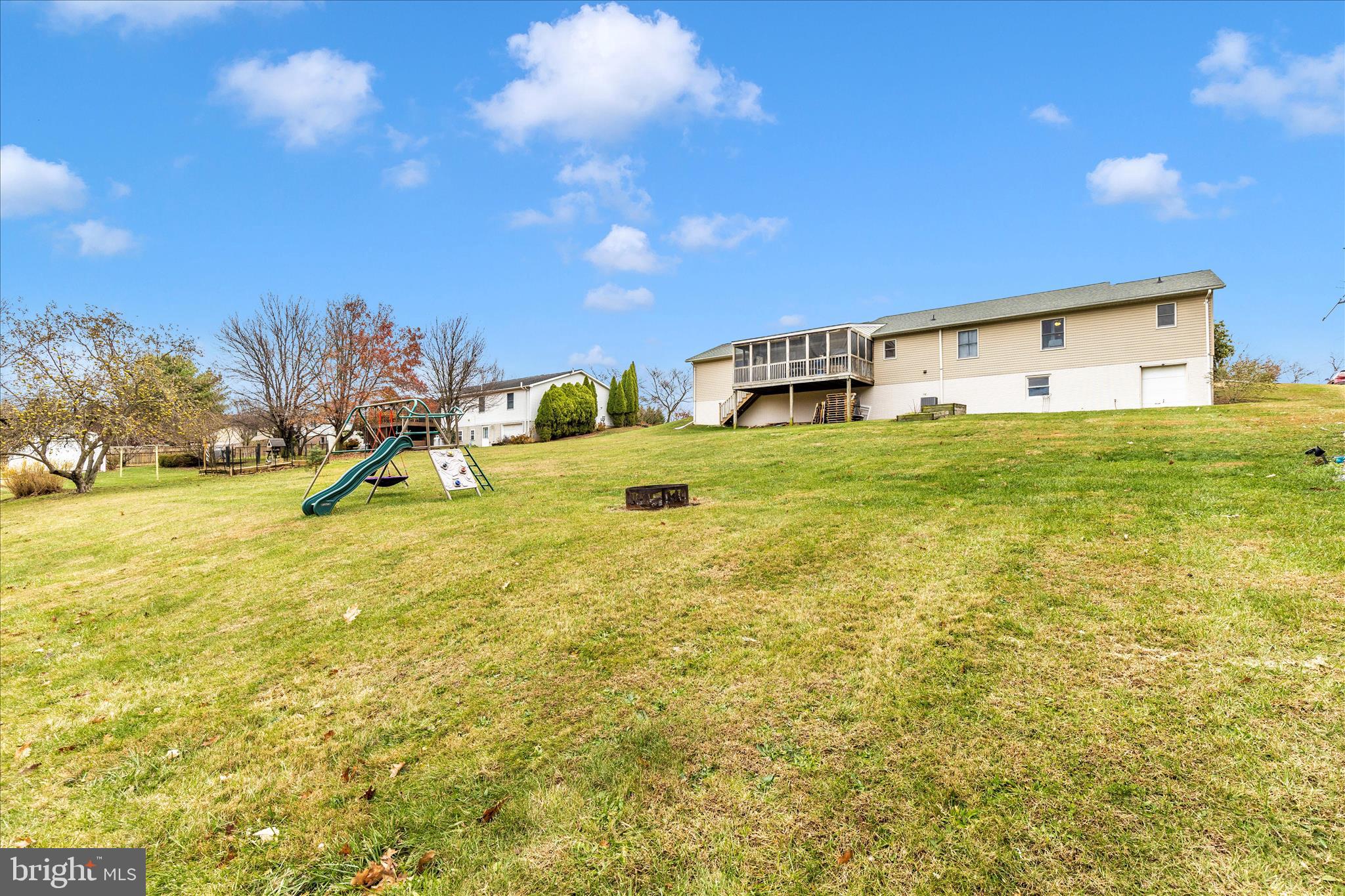 126 Game Trail Road Falling Waters, WV 25419 - Photo 35 of 41 a view of a big room with table and chairs