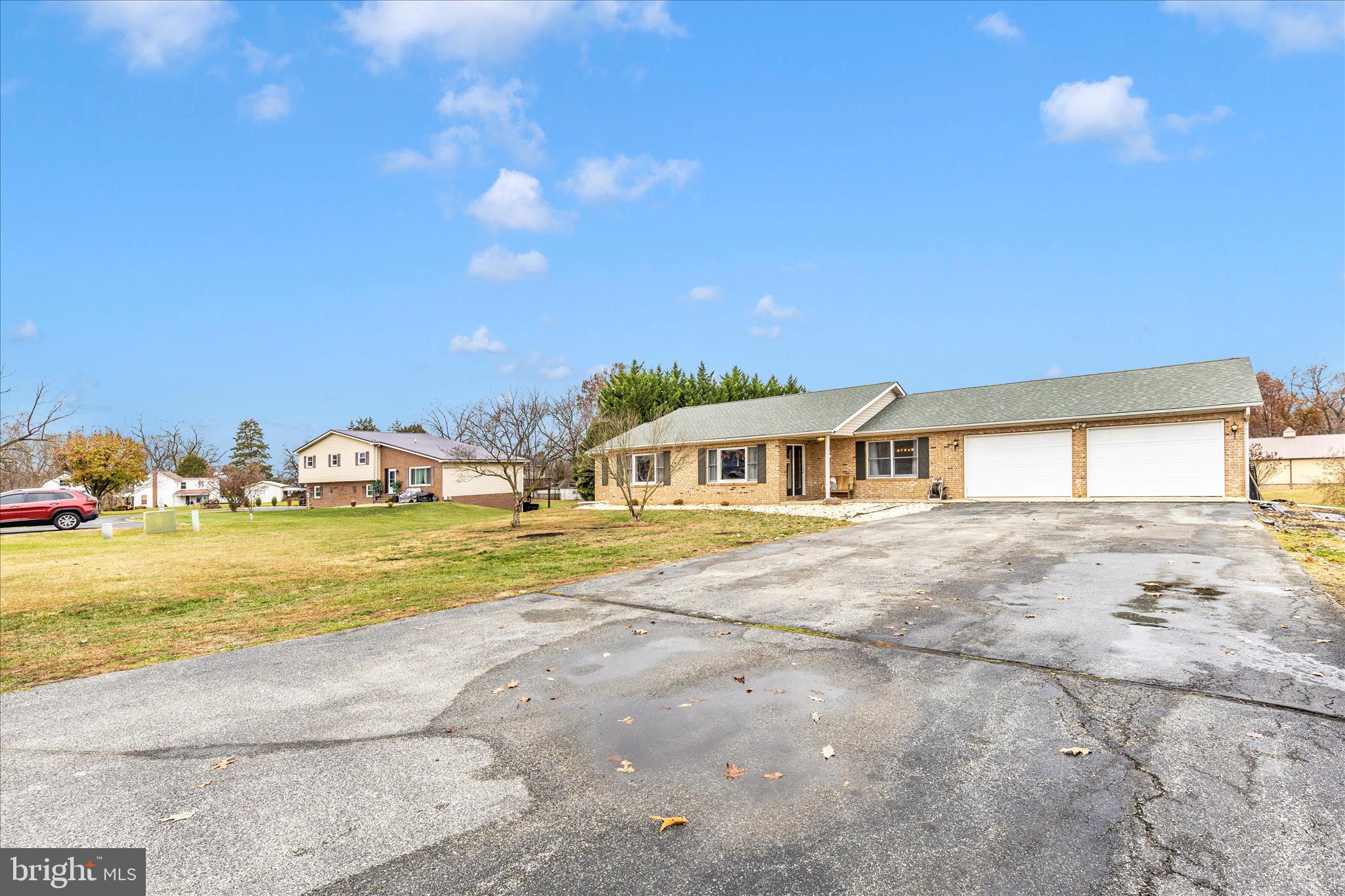 126 Game Trail Road Falling Waters, WV 25419 - Photo 37 of 41 a front view of a house with a yard