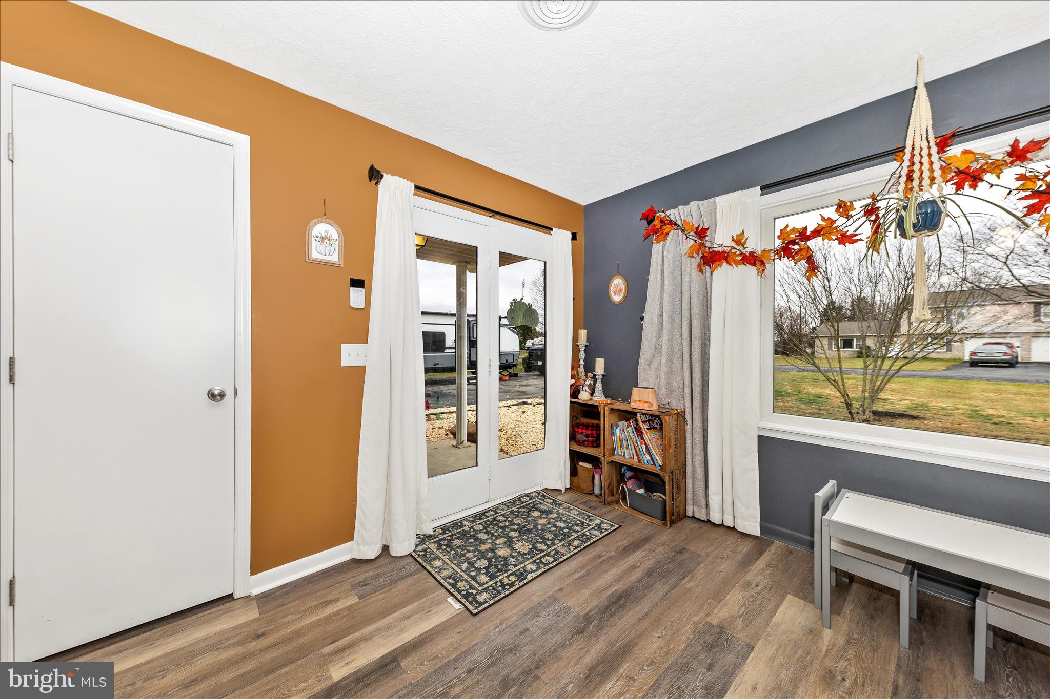 126 Game Trail Road Falling Waters, WV 25419 - Photo 4 of 41 a view of room with furniture and wooden floor