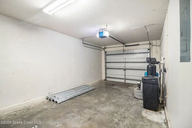 a view of a room with storage and utility room