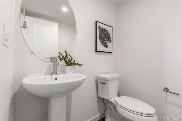 a bed room with a bed and a large window