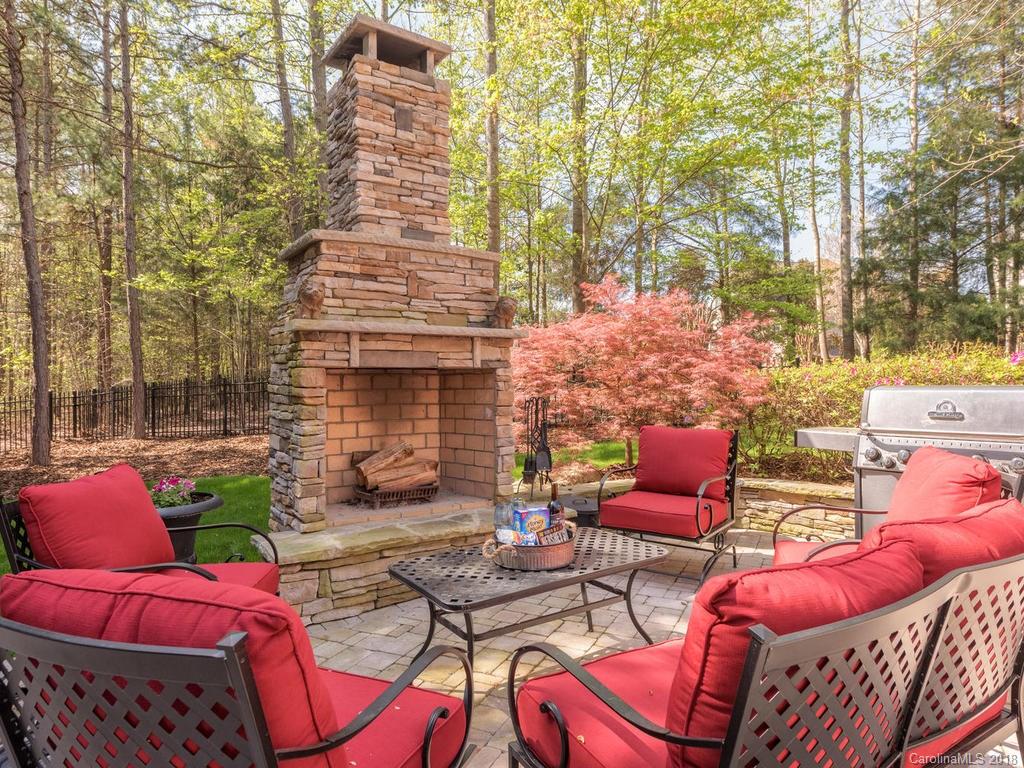 2001 Streamview Court Marvin, NC 28173 - Photo 2 of 35 a front view of a house with outdoor seating