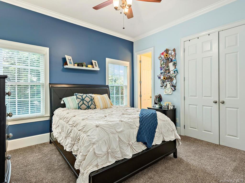 2001 Streamview Court Marvin, NC 28173 - Photo 21 of 35 a bed sitting in a bedroom next to a window