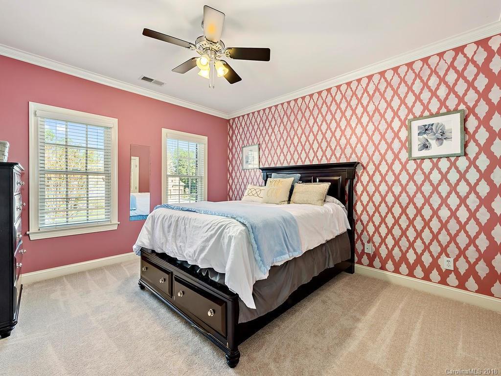 2001 Streamview Court Marvin, NC 28173 - Photo 27 of 35 a bed sitting in a spacious bedroom next to a window