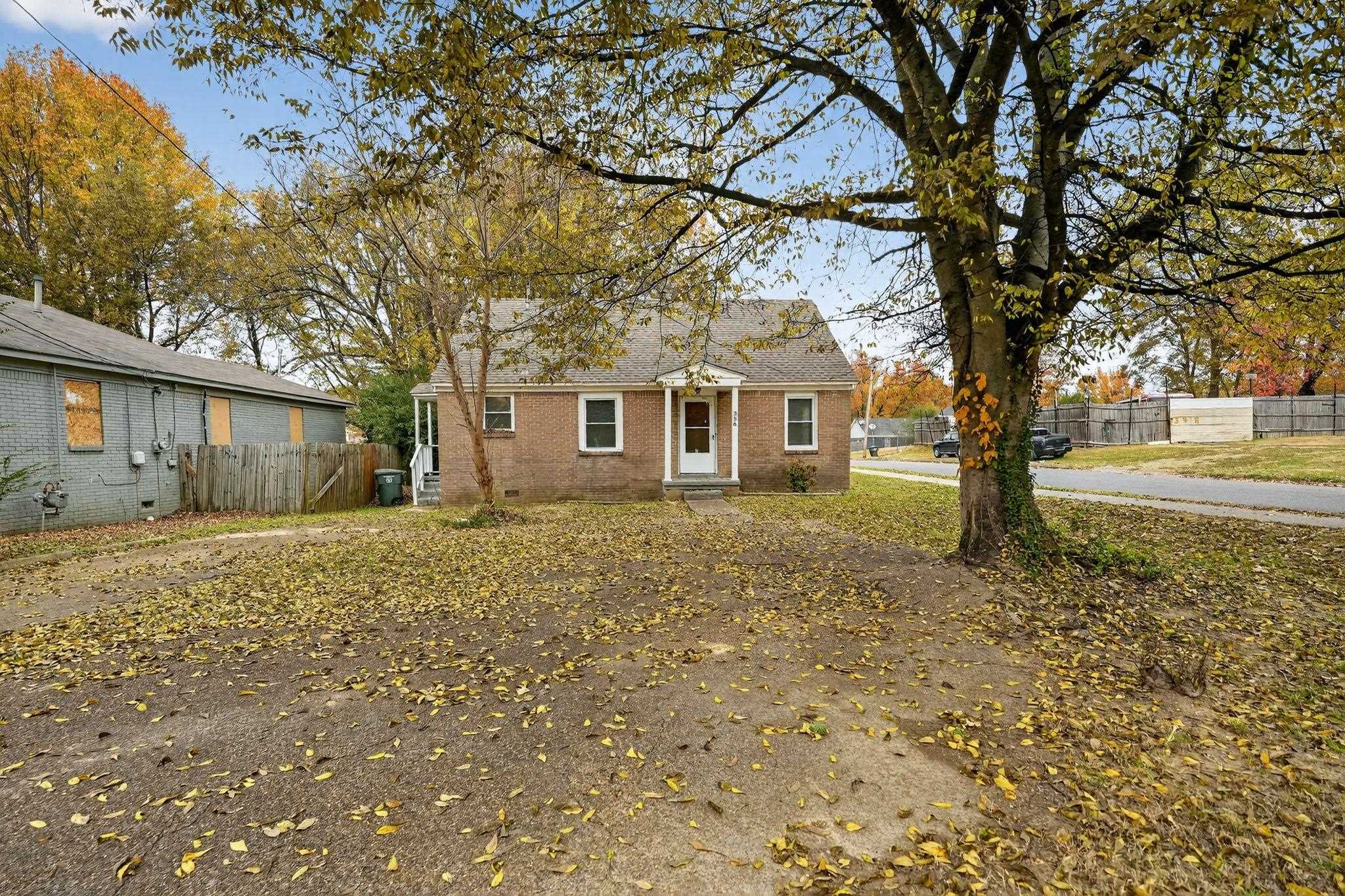 View of front of house featuring brick siding