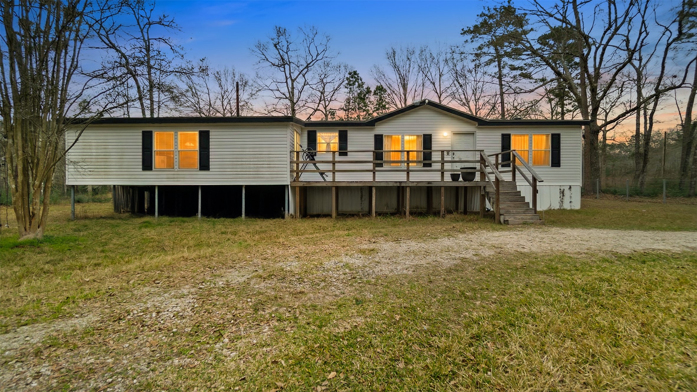 7735 North Walker Road Cleveland, TX 77328 - Photo 1 of 42 a view of house with a yard