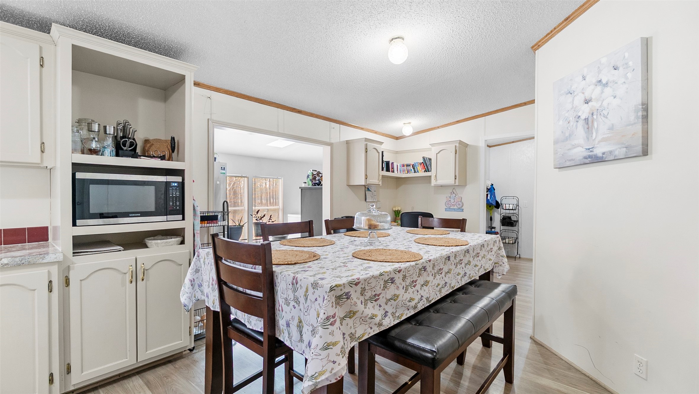 7735 North Walker Road Cleveland, TX 77328 - Photo 16 of 42 a dining room with furniture and window