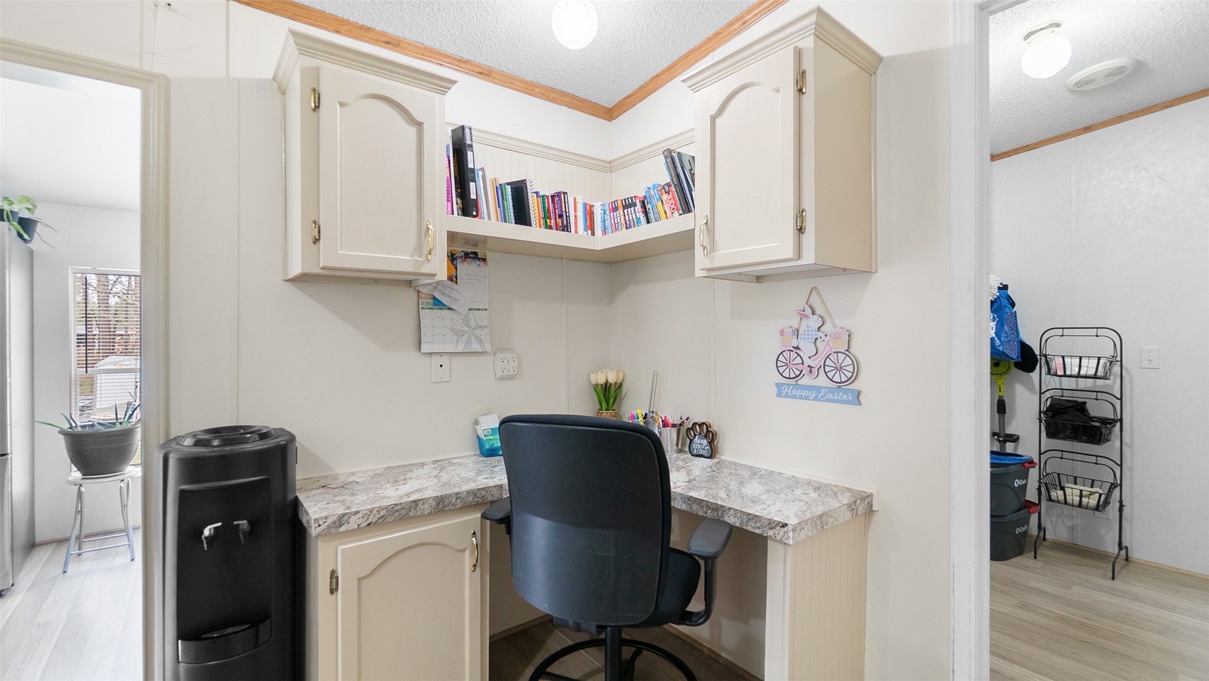 7735 North Walker Road Cleveland, TX 77328 - Photo 17 of 42 a view of workspace with furniture and wooden floor