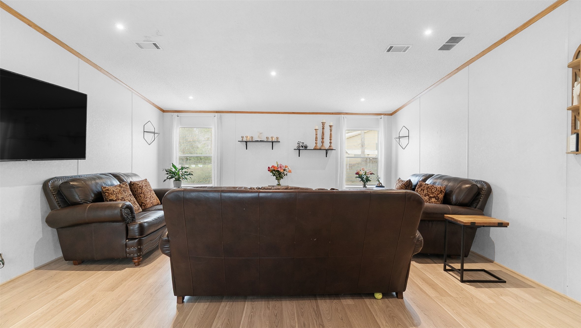 7735 North Walker Road Cleveland, TX 77328 - Photo 23 of 42 a living room with furniture and a flat screen tv