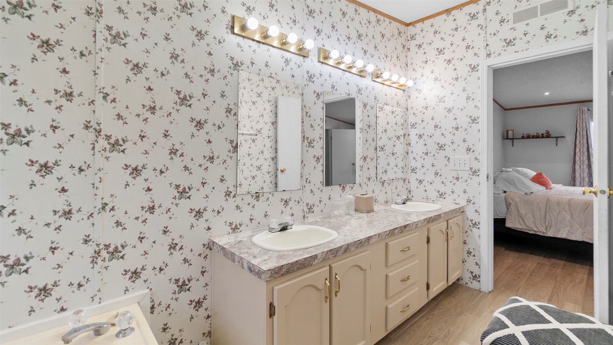 7735 North Walker Road Cleveland, TX 77328 - Photo 29 of 42 a bathroom with a sink and a mirror