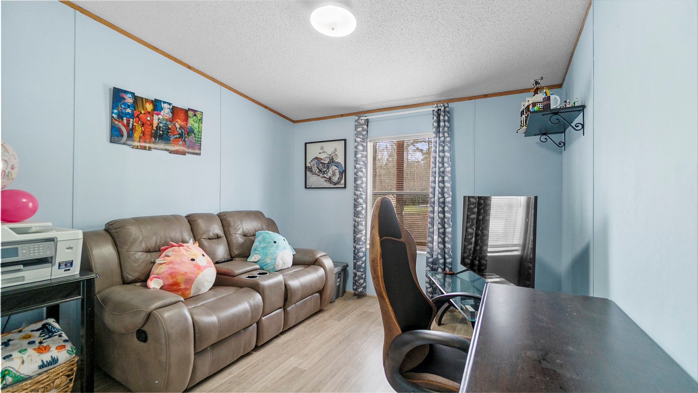 7735 North Walker Road Cleveland, TX 77328 - Photo 30 of 42 a living room with furniture gym equipment and a window