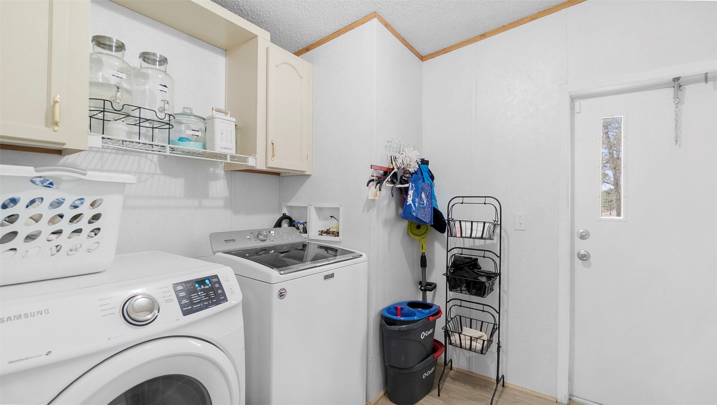 7735 North Walker Road Cleveland, TX 77328 - Photo 34 of 42 a view of utility room with washer and dryer