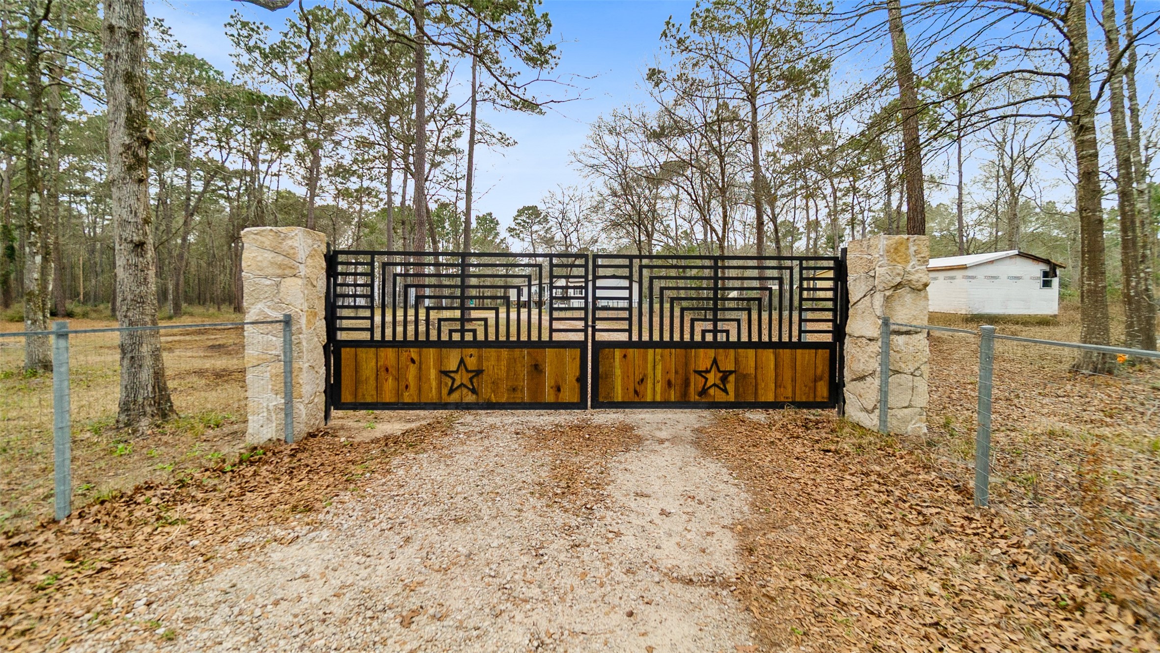 7735 North Walker Road Cleveland, TX 77328 - Photo 5 of 42 a view of a yard with wooden fence