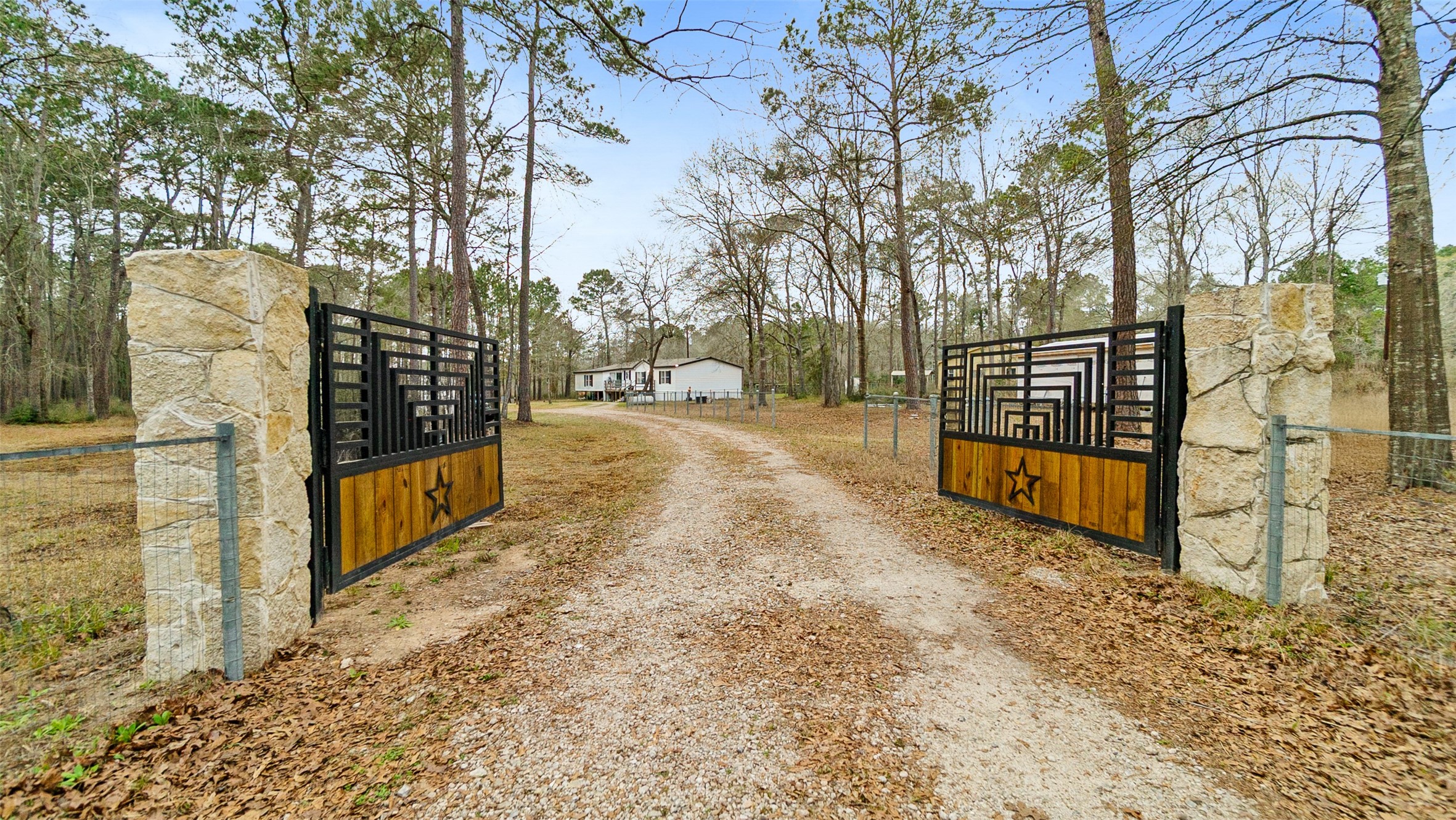7735 North Walker Road Cleveland, TX 77328 - Photo 6 of 42 a view of a yard with wooden fence