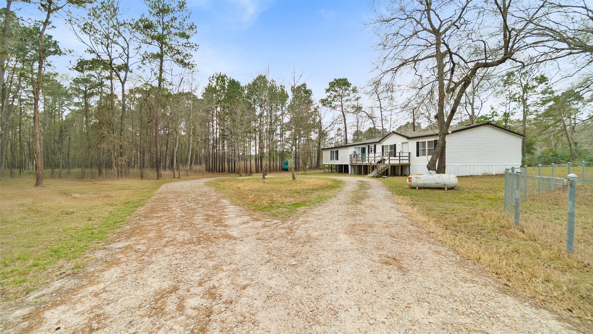 7735 North Walker Road Cleveland, TX 77328 - Photo 8 of 42 a view of a yard with swimming pool