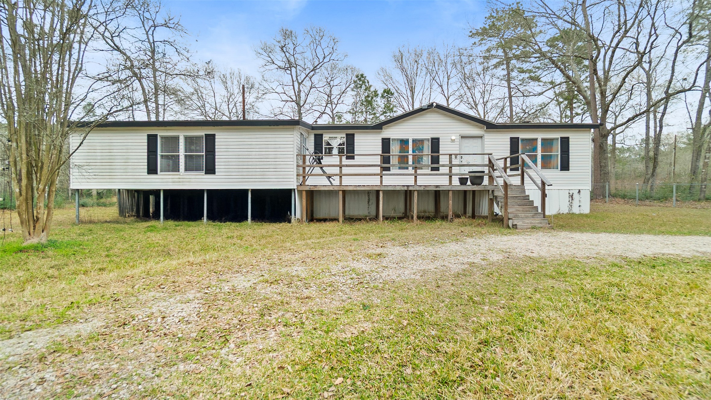 7735 North Walker Road Cleveland, TX 77328 - Photo 9 of 42 a house view with a garden space