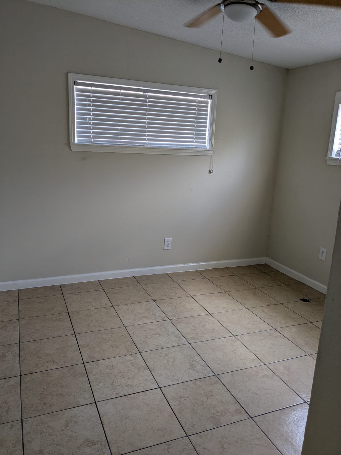 3359 Frick Road, Unit 6 Houston, TX 77086 - Photo 7 of 10 a view of room with window