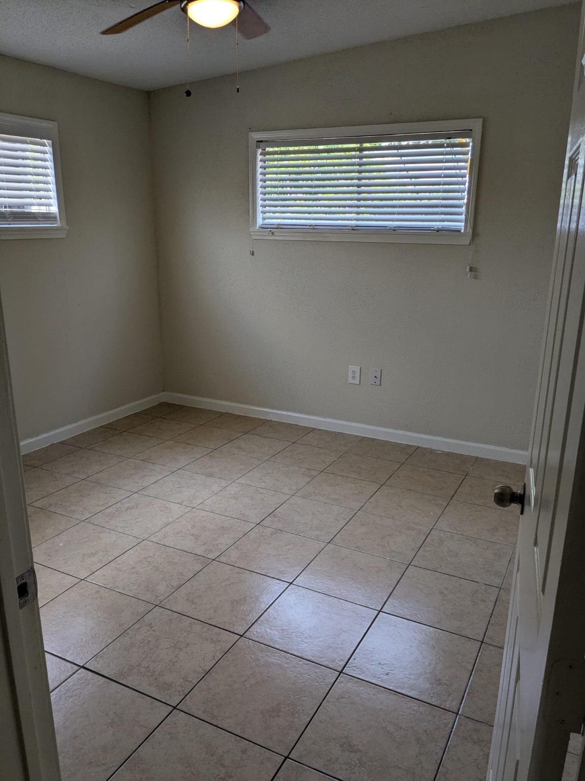 3359 Frick Road, Unit 6 Houston, TX 77086 - Photo 8 of 10 a view of an empty room with a window