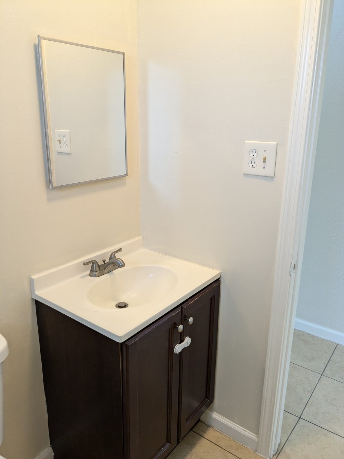3359 Frick Road, Unit 6 Houston, TX 77086 - Photo 9 of 10 a bathroom with a sink vanity and a mirror