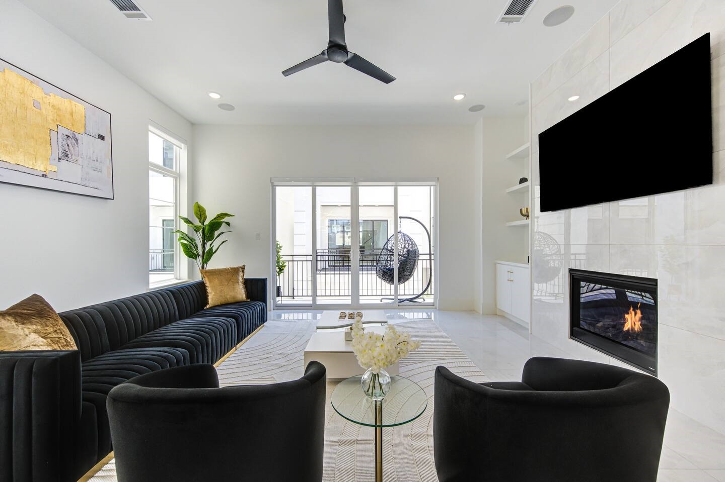 5702 Fairdale Lane, Unit C Houston, TX 77057 - Photo 18 of 47 a living room with fireplace furniture and a flat screen tv