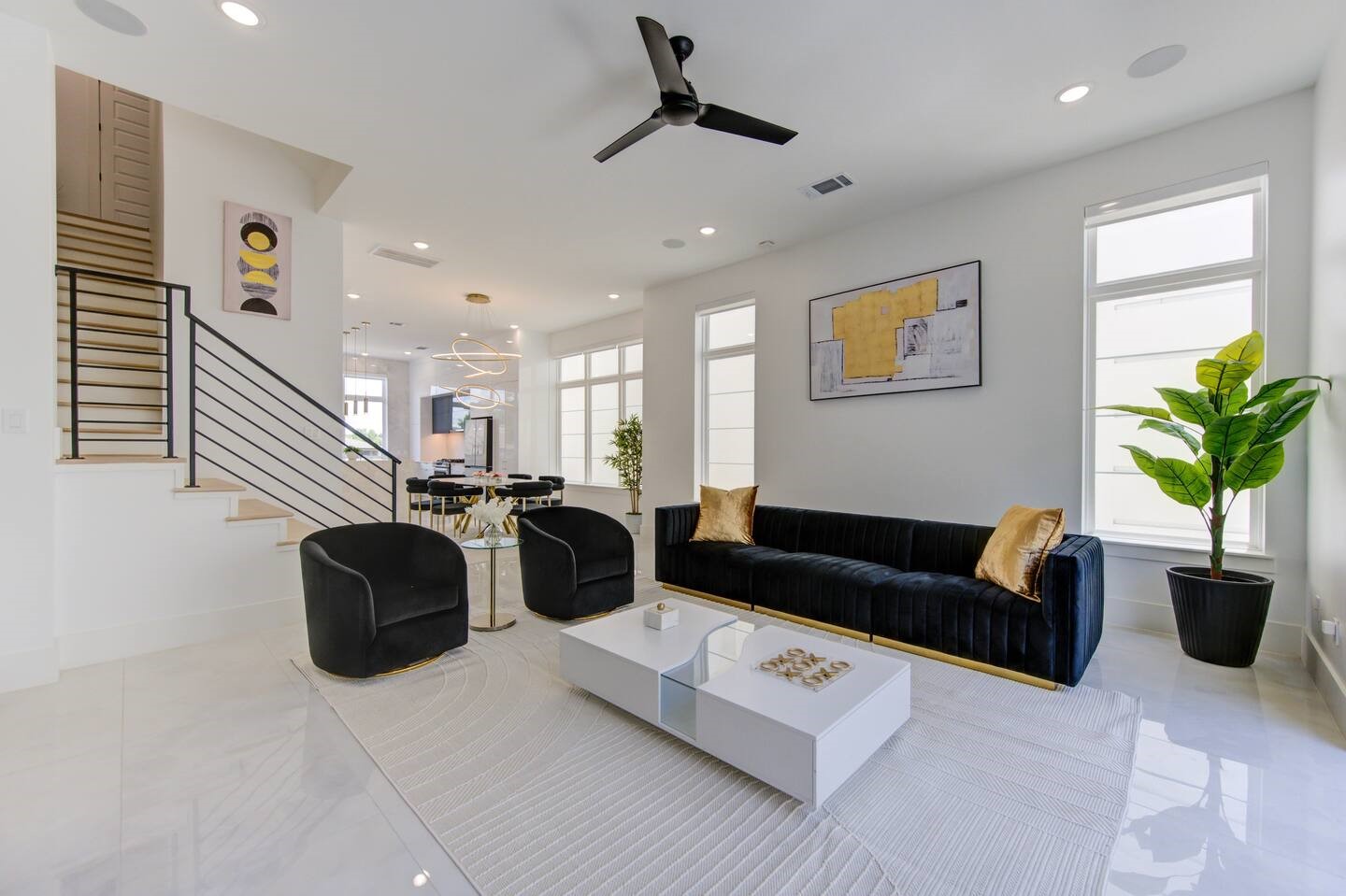 5702 Fairdale Lane, Unit C Houston, TX 77057 - Photo 21 of 47 a living room with furniture potted plant and a window
