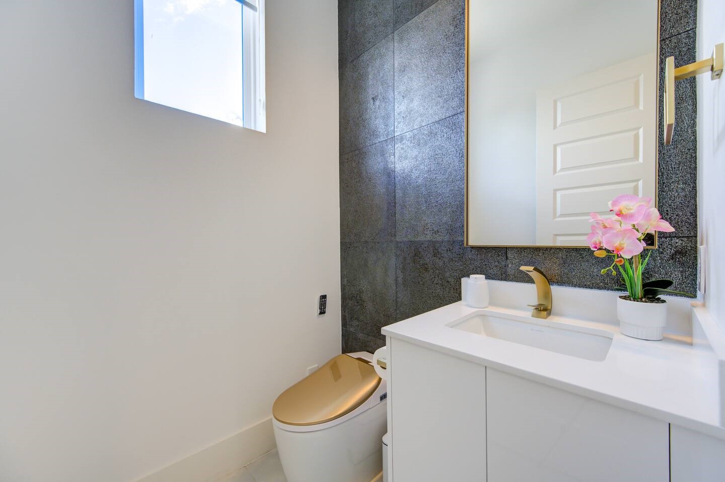 5702 Fairdale Lane, Unit C Houston, TX 77057 - Photo 22 of 47 a bathroom with a sink and a toilet