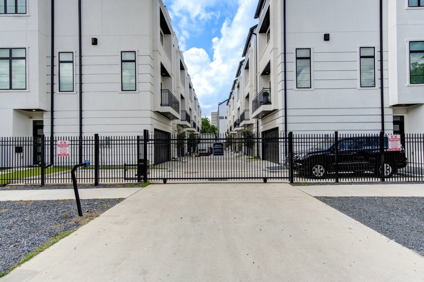 5702 Fairdale Lane, Unit C Houston, TX 77057 - Photo 3 of 47 a view of a street with parked cars