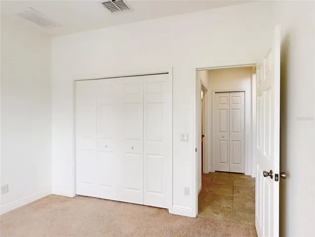 a view of a room with an empty space
