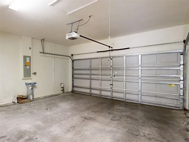 a view of a room with wooden floor and walls