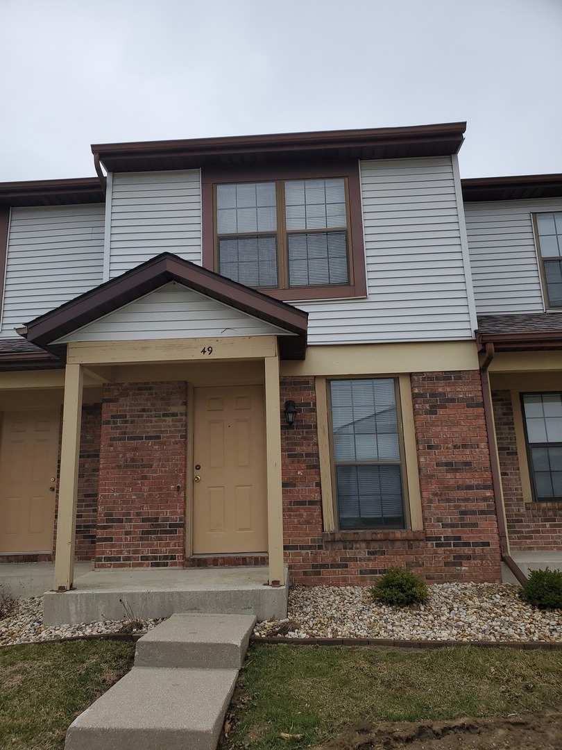 700 North Adelaide Street, Unit 49 Normal, IL 61761 - Photo 2 of 15 a front view of a house