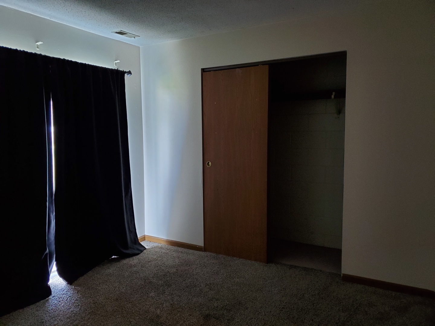 700 North Adelaide Street, Unit 49 Normal, IL 61761 - Photo 11 of 15 an empty room with closet