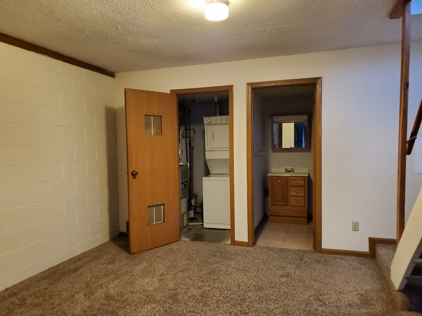 700 North Adelaide Street, Unit 49 Normal, IL 61761 - Photo 12 of 15 an empty room with closet and a bathroom