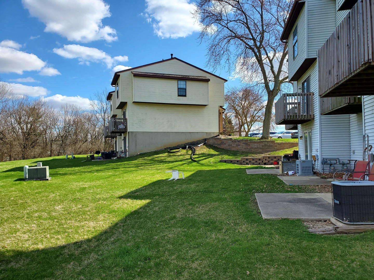 700 North Adelaide Street, Unit 49 Normal, IL 61761 - Photo 14 of 15 a front view of a house with garden