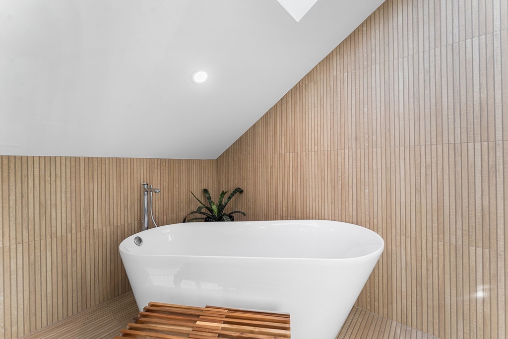11 Lowell Street, Unit B Arlington, MA 02476 - Photo 21 of 31 a bathroom with a bathtub